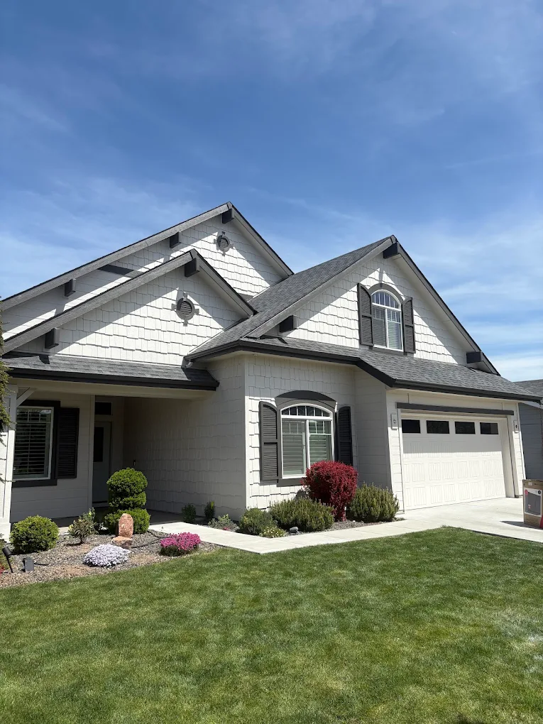 Residential exterior painting of a craftsman home with shaker siding in Boise, Idaho